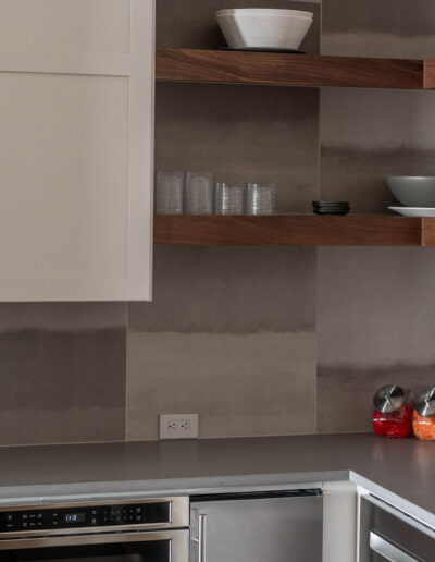 luxury grey tile kitchen with grey quartz countertop