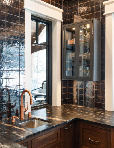 luxury dark grey marble and tile bar