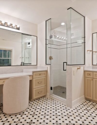 custom luxury white tile walk-in shower and marble bathroom countertops