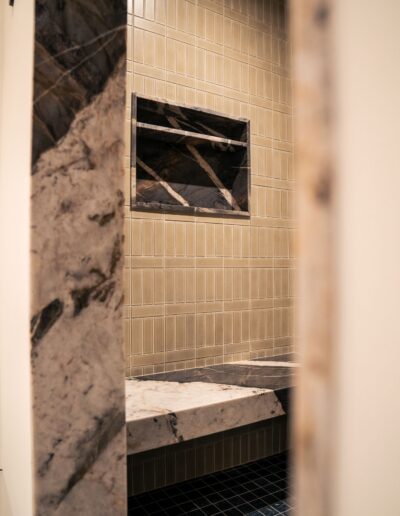 custom light tile and marble shower with insert